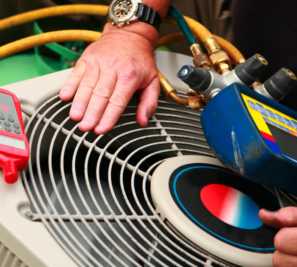 hands repairing ac unit