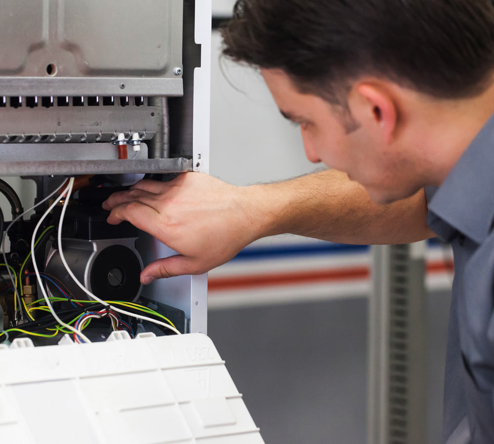 man working on heating